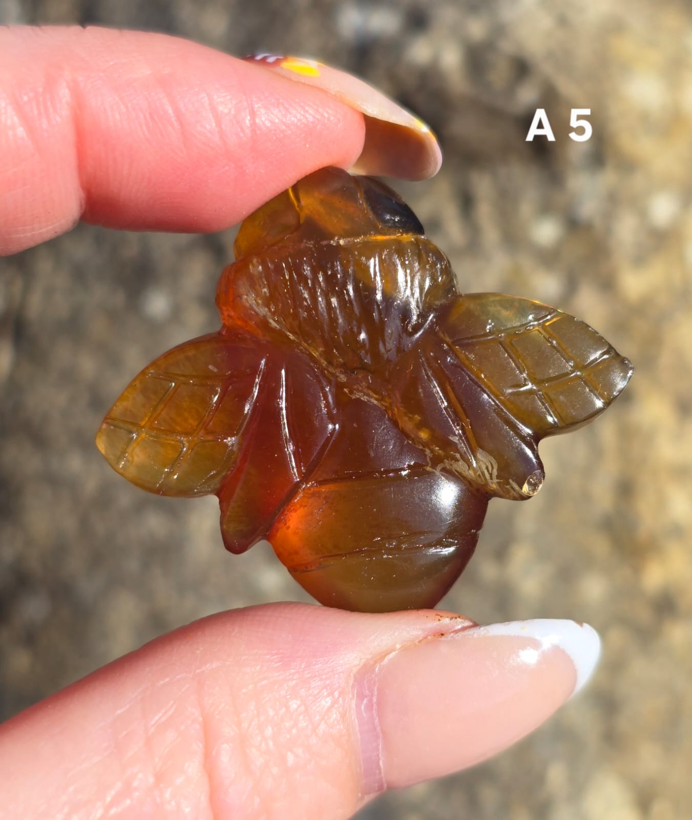 Blue Amber carved bees