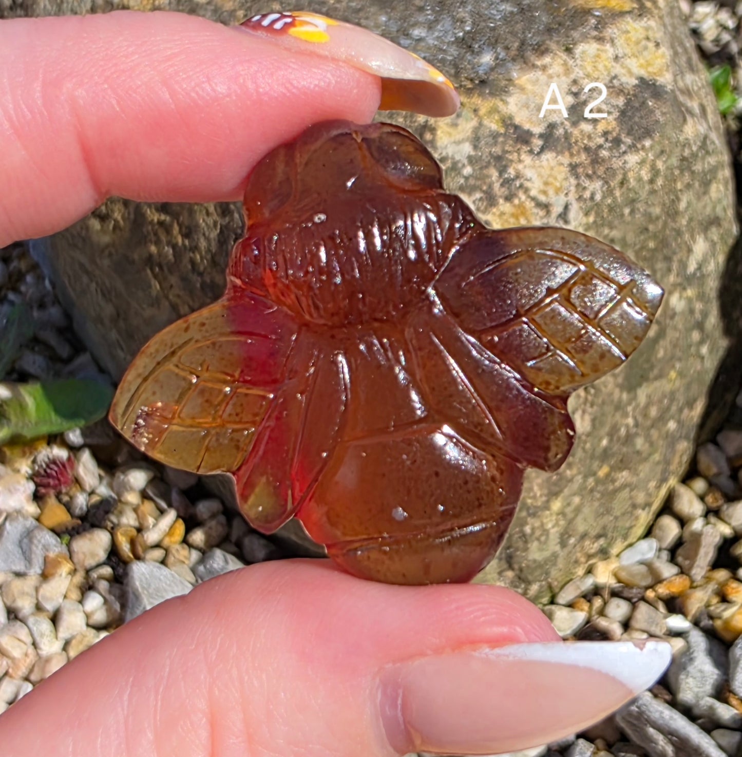 Blue Amber carved bees