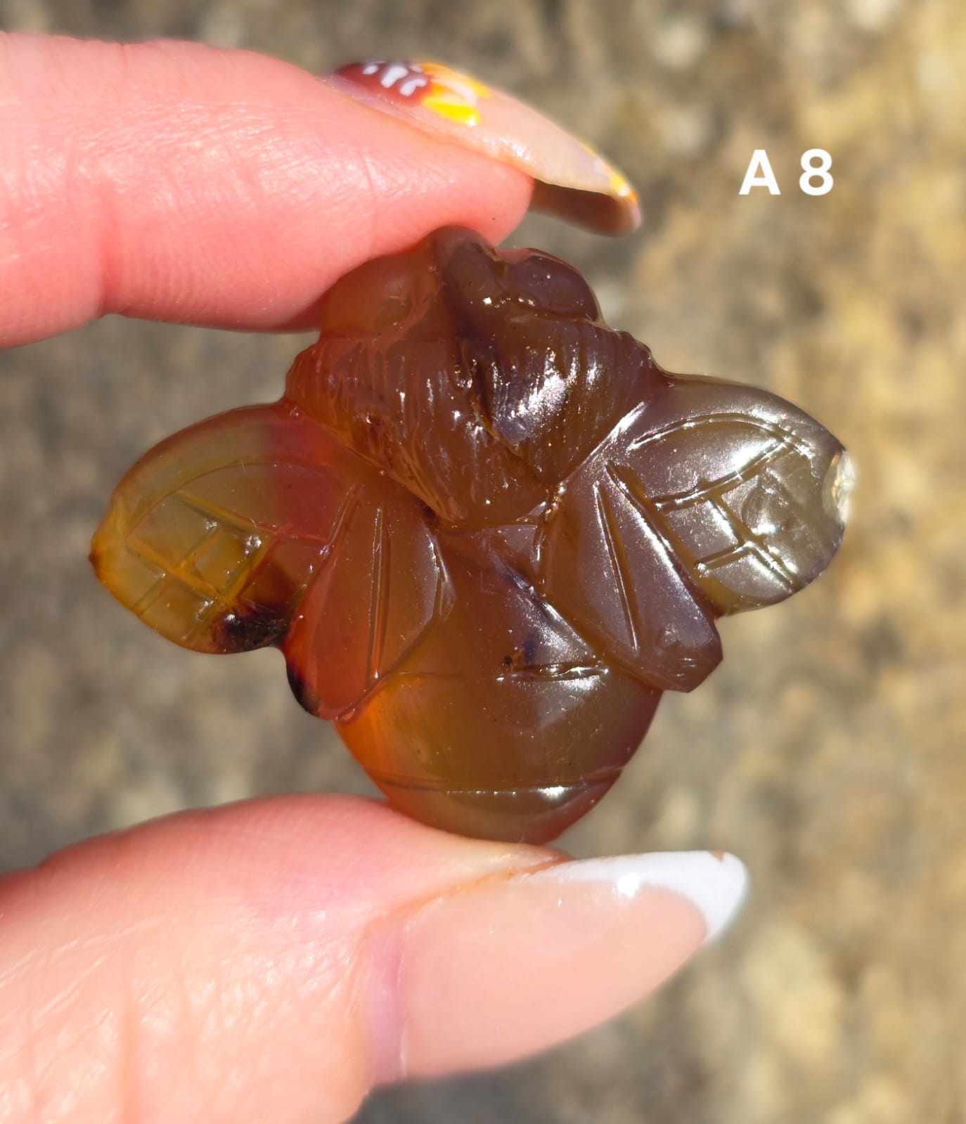 Blue Amber carved bees