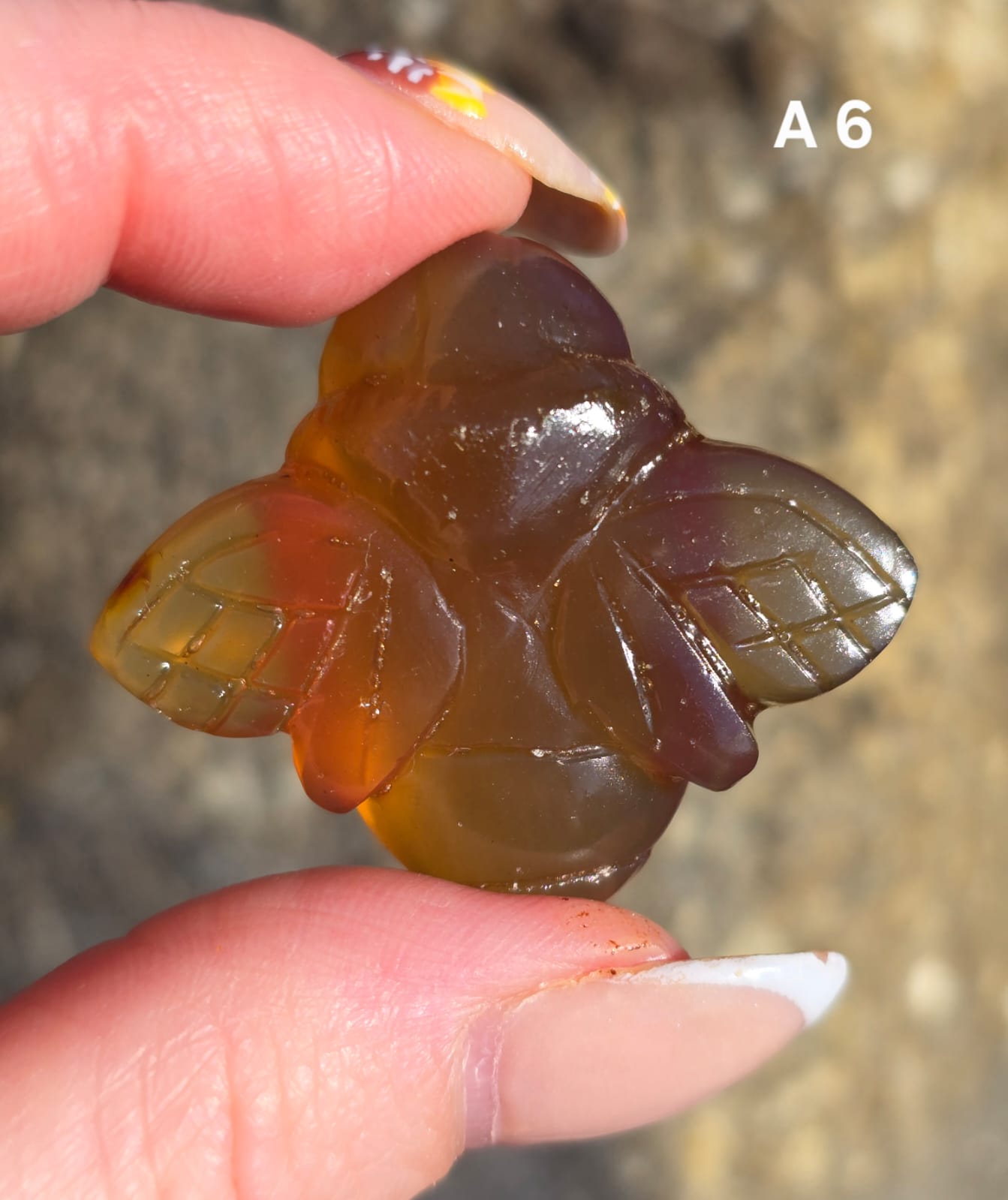 Blue Amber carved bees