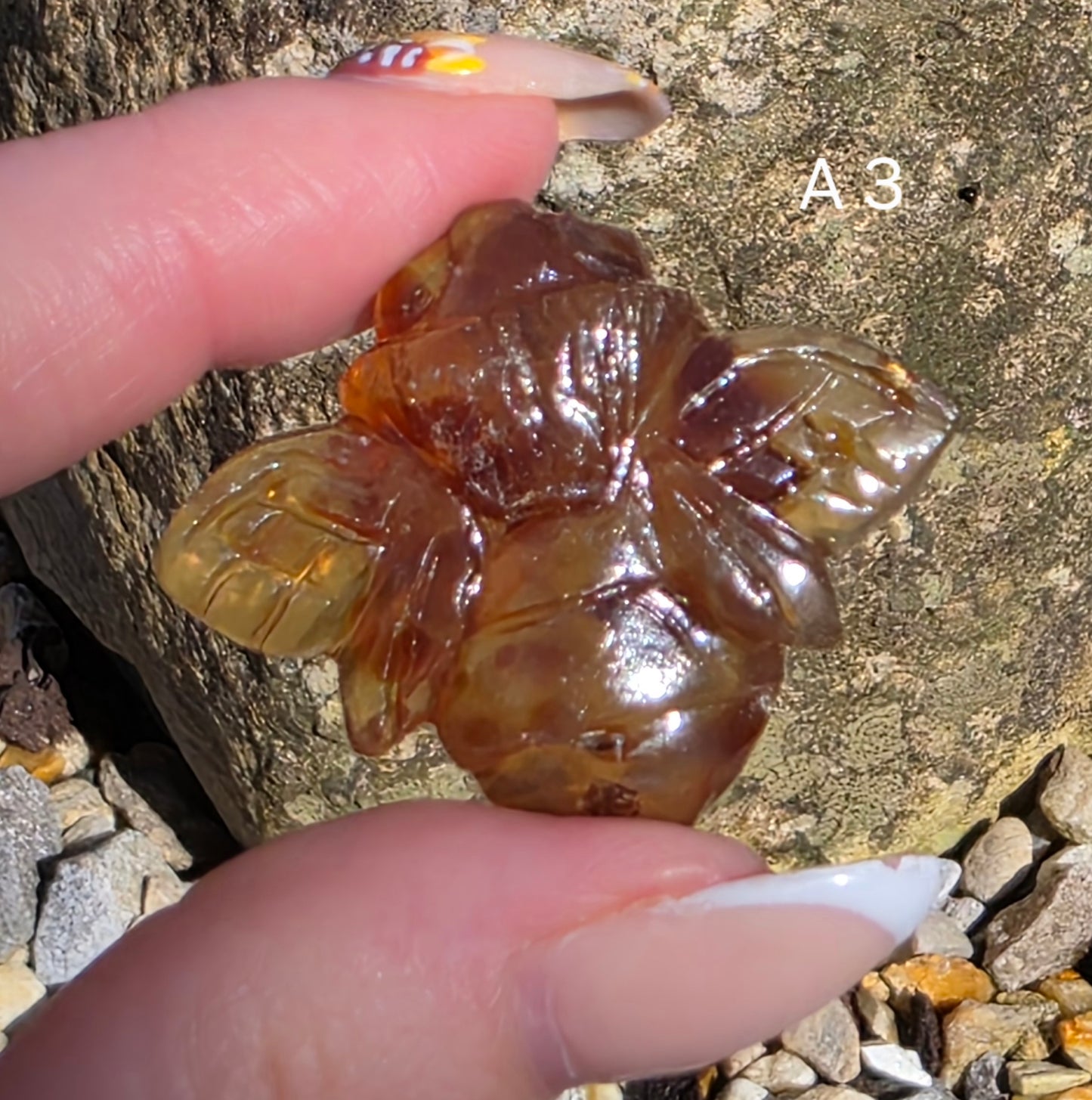 Blue Amber carved bees
