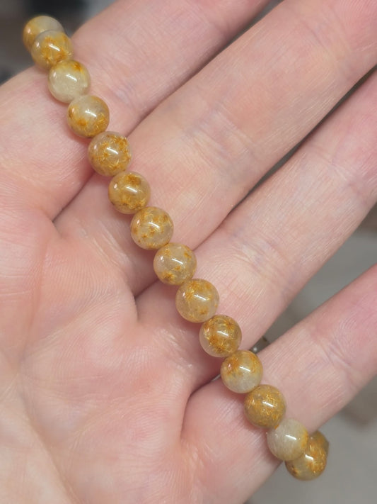 A Gorgeous Sunflower Rutile 6mm bracelet