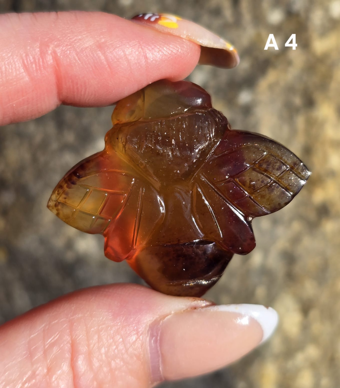 Blue Amber carved bees