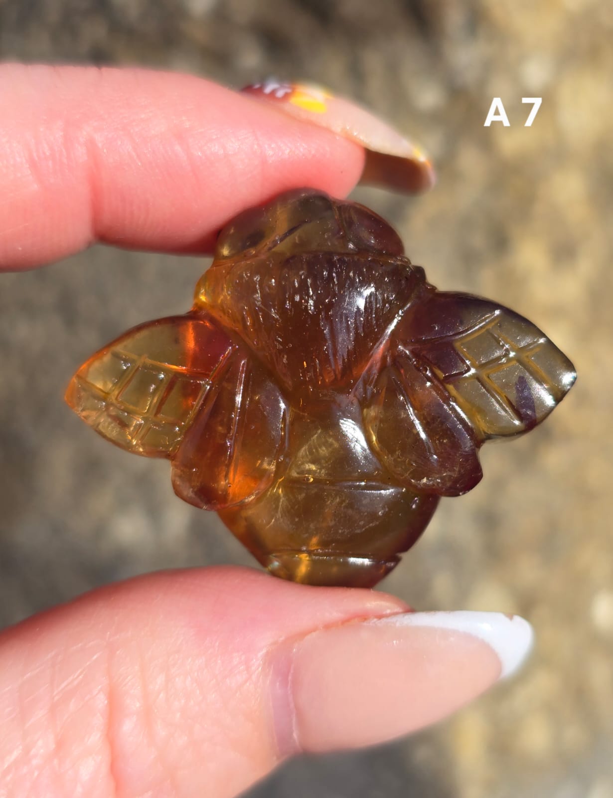 Blue Amber carved bees